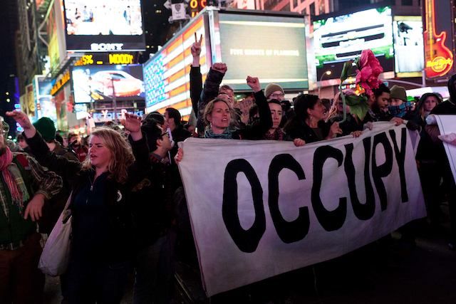 Protesters rally in Times Square